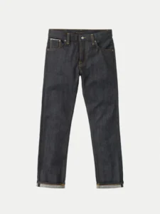 Professional photo of a pair of dark blue jeans on a neutral background