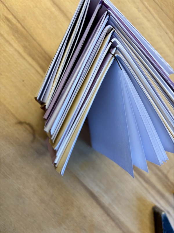 A stack of 8 notebooks
